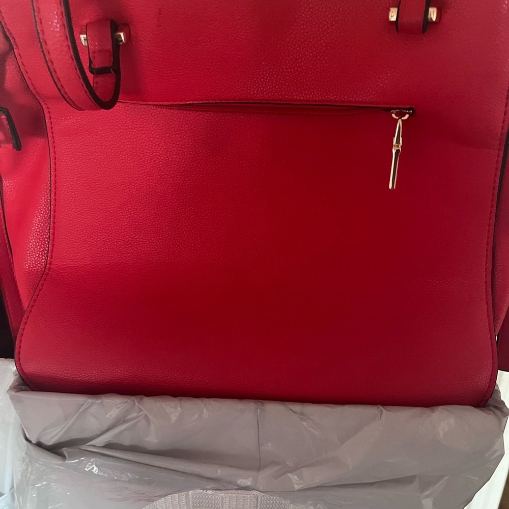 Watermelon colored beautiful handbag.  Never used
